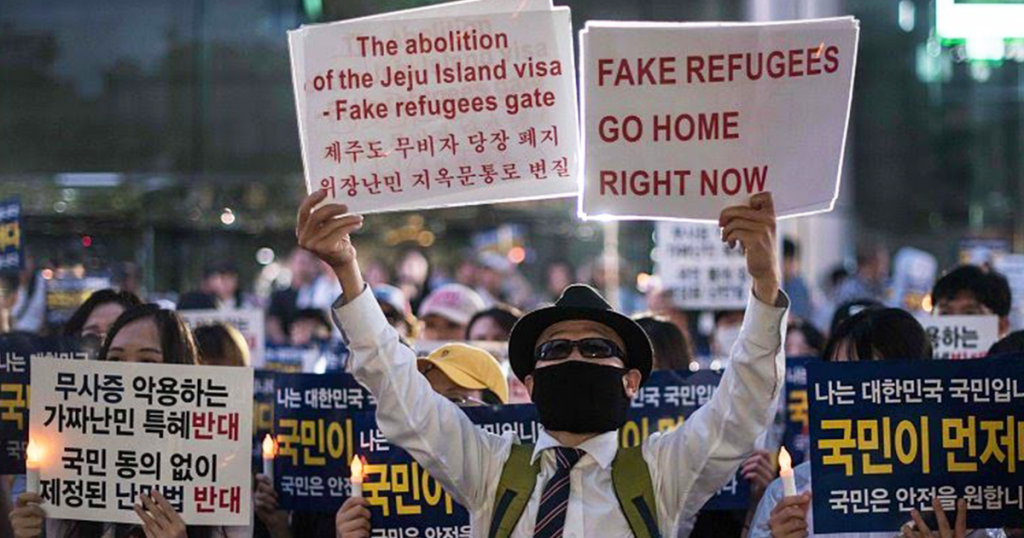 난민 수용 반대 시위 사진. 이미지 - 사우스 차이나 모닝 포스트